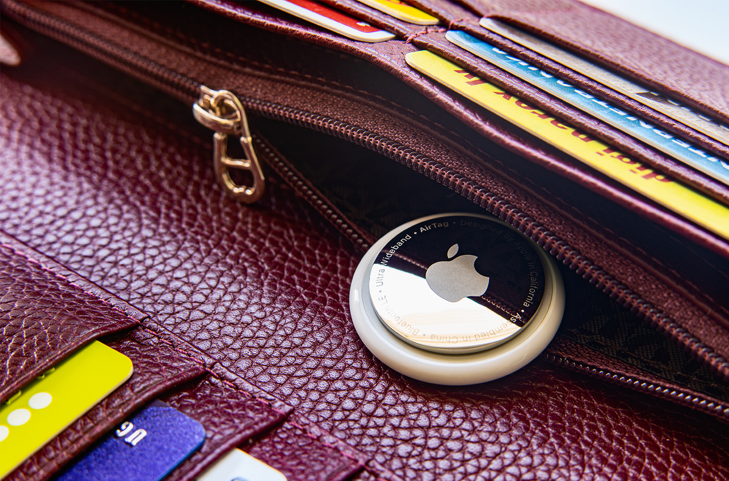An Apple AirTag inside a wallet