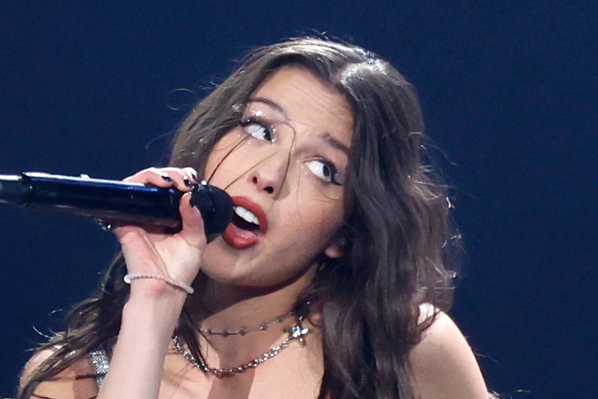 Olivia Rodrigo's Leather Top Pops Off On Stage