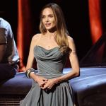 angelina-jolie-debuts-new-chest-tattoo-in-strapless-gown-on-2024-tony-awards-red-carpet