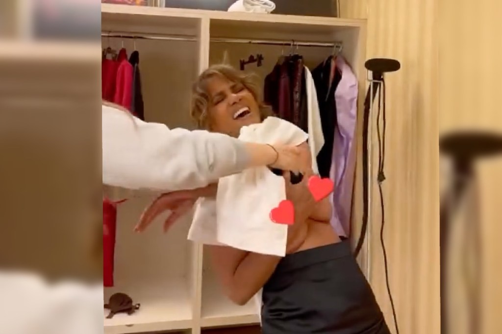 halle-berry-suffers-crazy-wardrobe-malfunction-trying-to-remove-shirt-in-hilarious-video