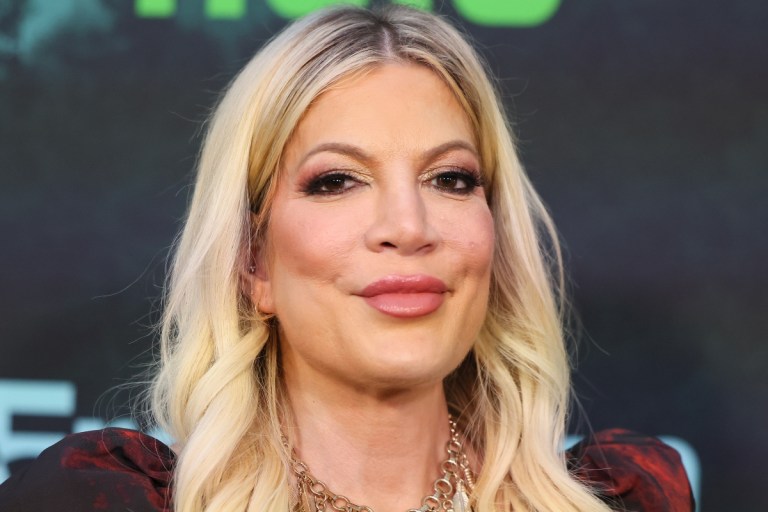 51 Year Old Tori Spelling Shows Off Figure In Neon Green Bikini