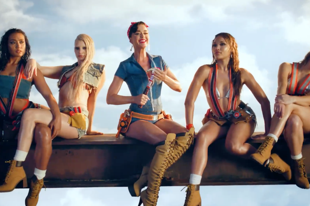 katy-perry-rocks-risque-rosie-the-riveter-cosplay-in-womans-world-teaser