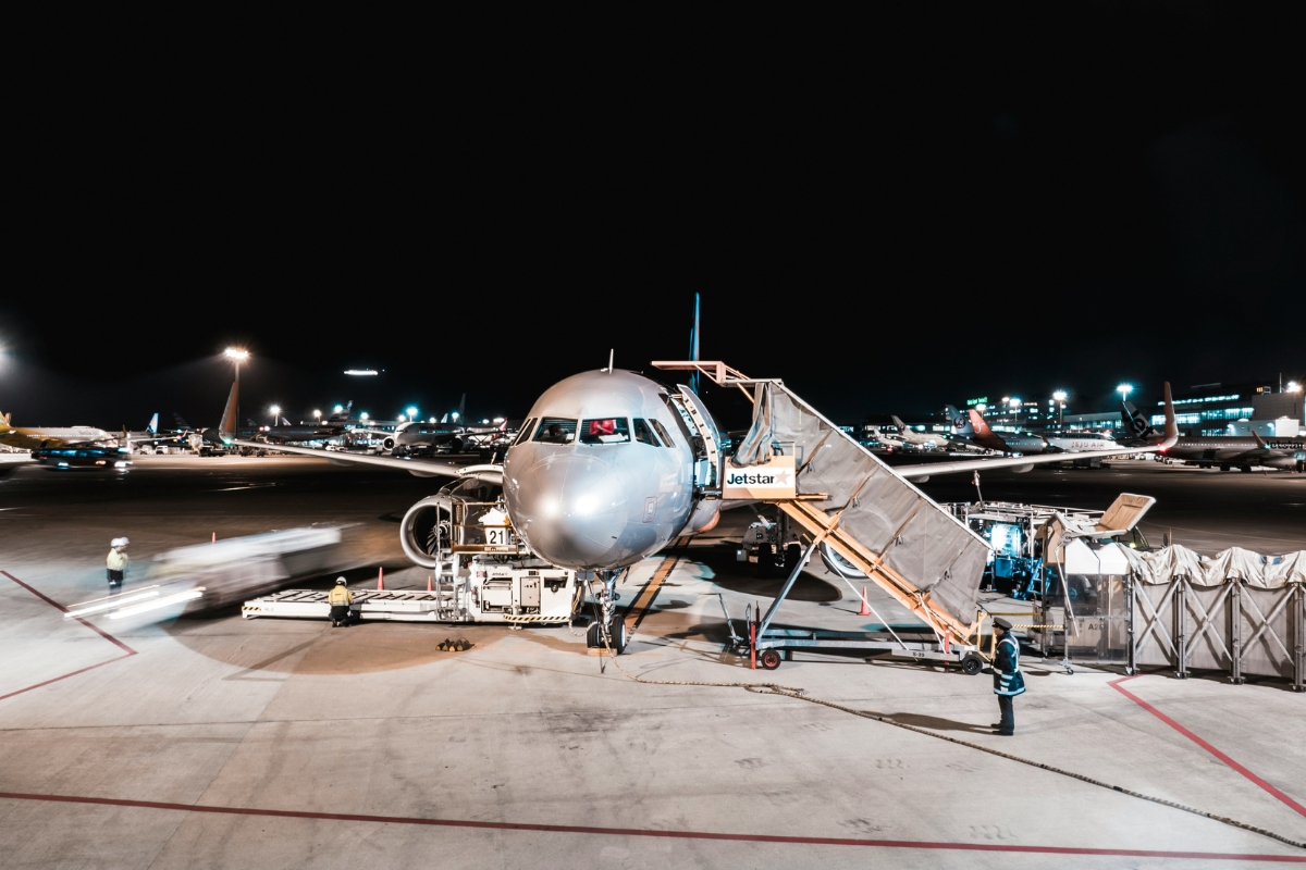 Airline Passenger Arrested After Opening Emergency Exit, Walking on Plane’s Wing and Engine