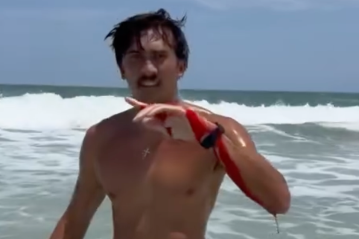 florida-surfer-calmly-walks-away-from-shark-bite-in-wild-video