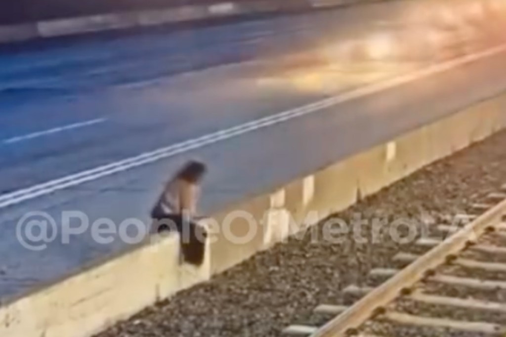 man-attacks-woman-attempts-to-drag-her-into-traffic-in-horrifying-video