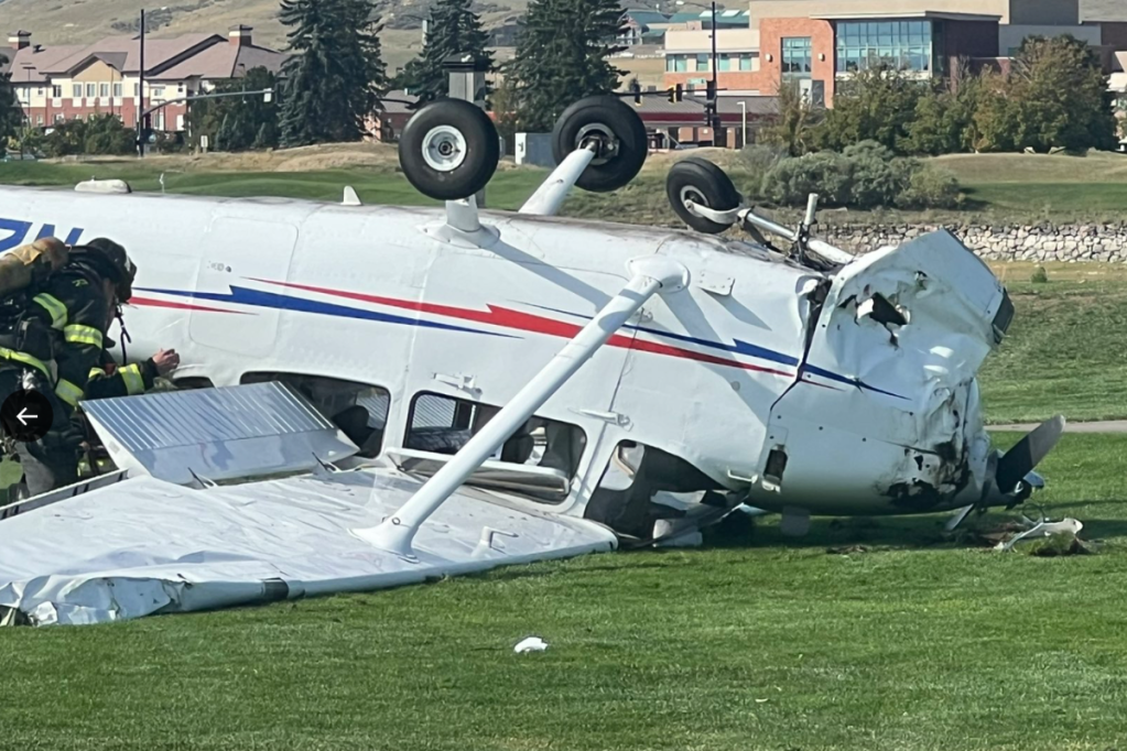 2-people-walk-away-after-a-small-plane-crashes-lands-upside-on-golf-course