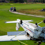 2-people-walk-away-after-a-small-plane-crashes-lands-upside-on-golf-course