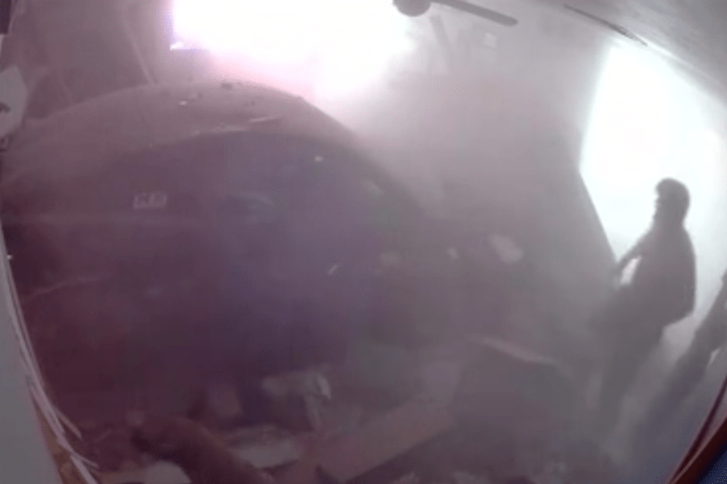 couple-dive-out-of-way-as-car-smashes-through-their-living-room-in-shocking-video