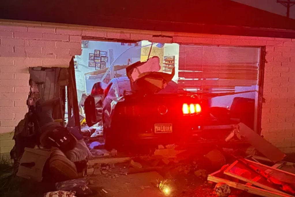 couple-dive-out-of-way-as-car-smashes-through-their-living-room-in-shocking-video