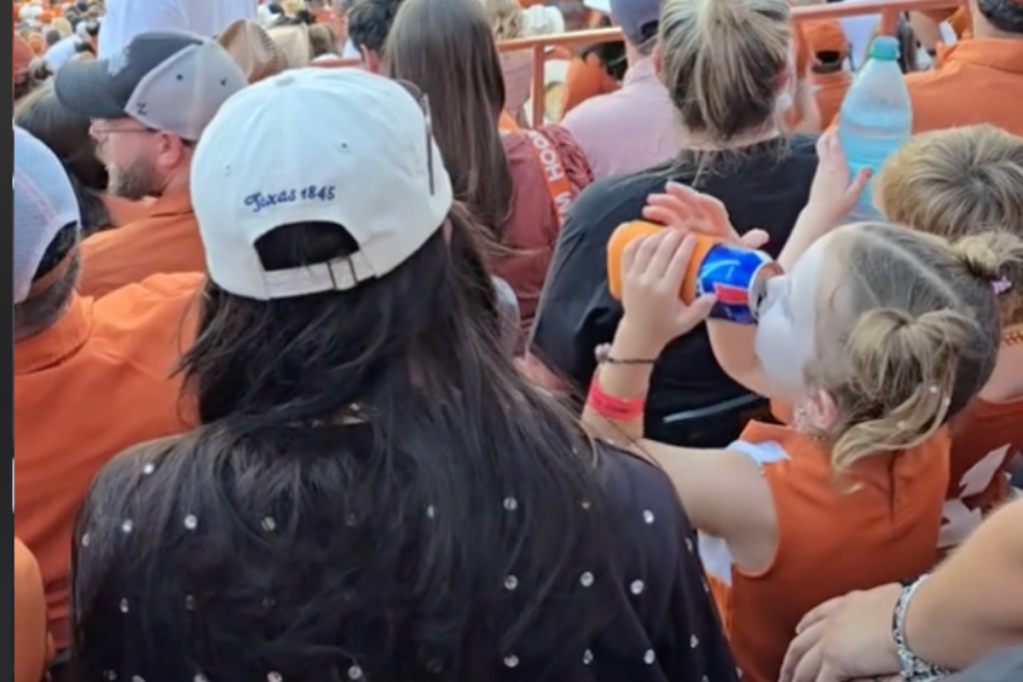 little-girl-seen-chugging-from-beer-can-at-football-game-in-video