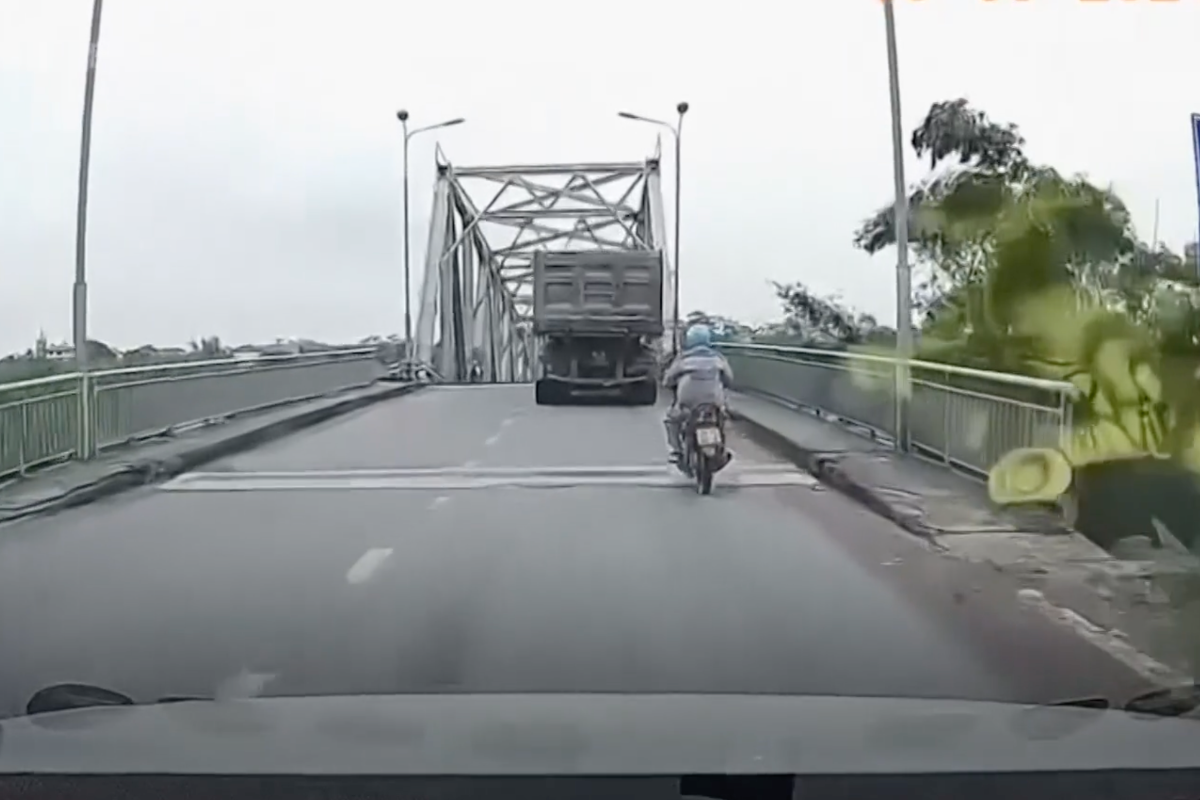 typhoon-collapses-busy-bridge-sends-vehicles-plunging-into-river-in-horrifying-video