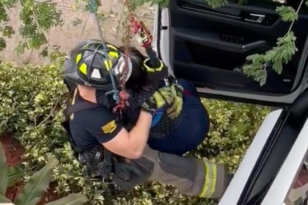 woman-crashes-through-parking-garage-suv-left-hanging-from-3rd-story