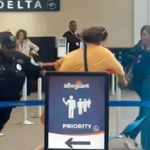 officer-faceplants-chasing-irate-woman-around-delta-airlines-counter-in-wild-video