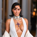 kim-kardashian-wears-princess-dianas-amethyst-cross-plunging-white-gown-in-new-photos