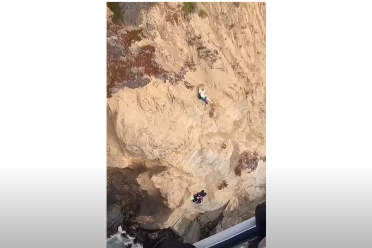 man-hanging-on-a-cliff-rescued-by-chp-helicopter-in-dramatic-video