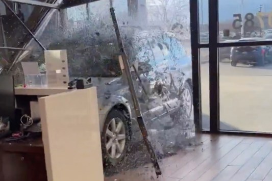 driver-crashes-through-car-dealership-wall-after-being-denied-in-a-refund-in-wild-video