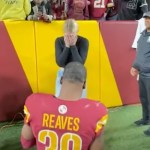 Jeremy Reaves proposes on the field after Commanders win. (photo: NFL)