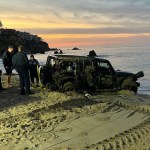 man-rescued-after-his-vehicle-becomes-fully-submerged-on-california-beach